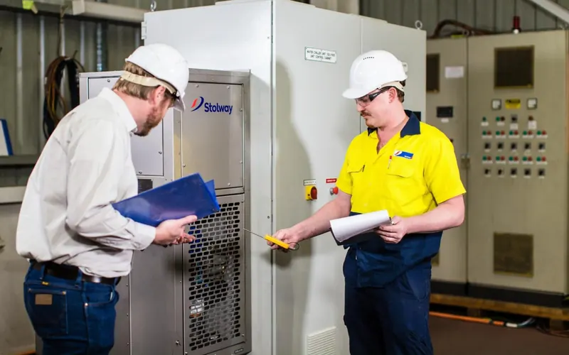 Two Stolway engineers at a unit on site