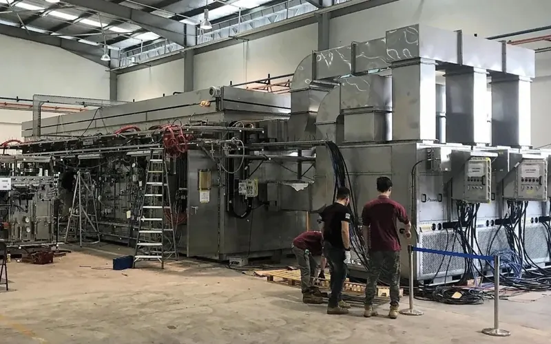 Technicians integrating Stolway packaged units with an analyser shelter